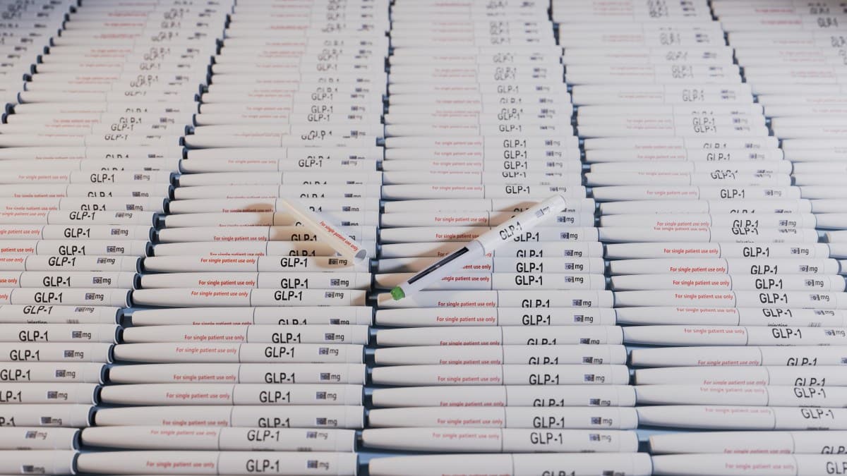 Vox coverage of employer health-plan decisions on GLP-1 weight-loss drugs, with a Getty Images photo.